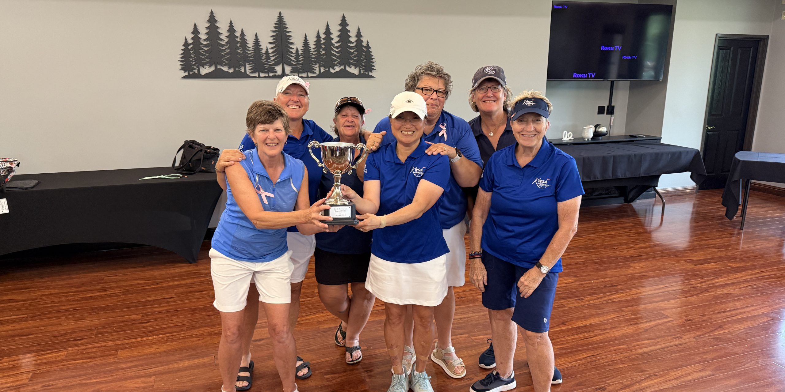 2026 KWGA Board members with the West Michigan Women's Cup.