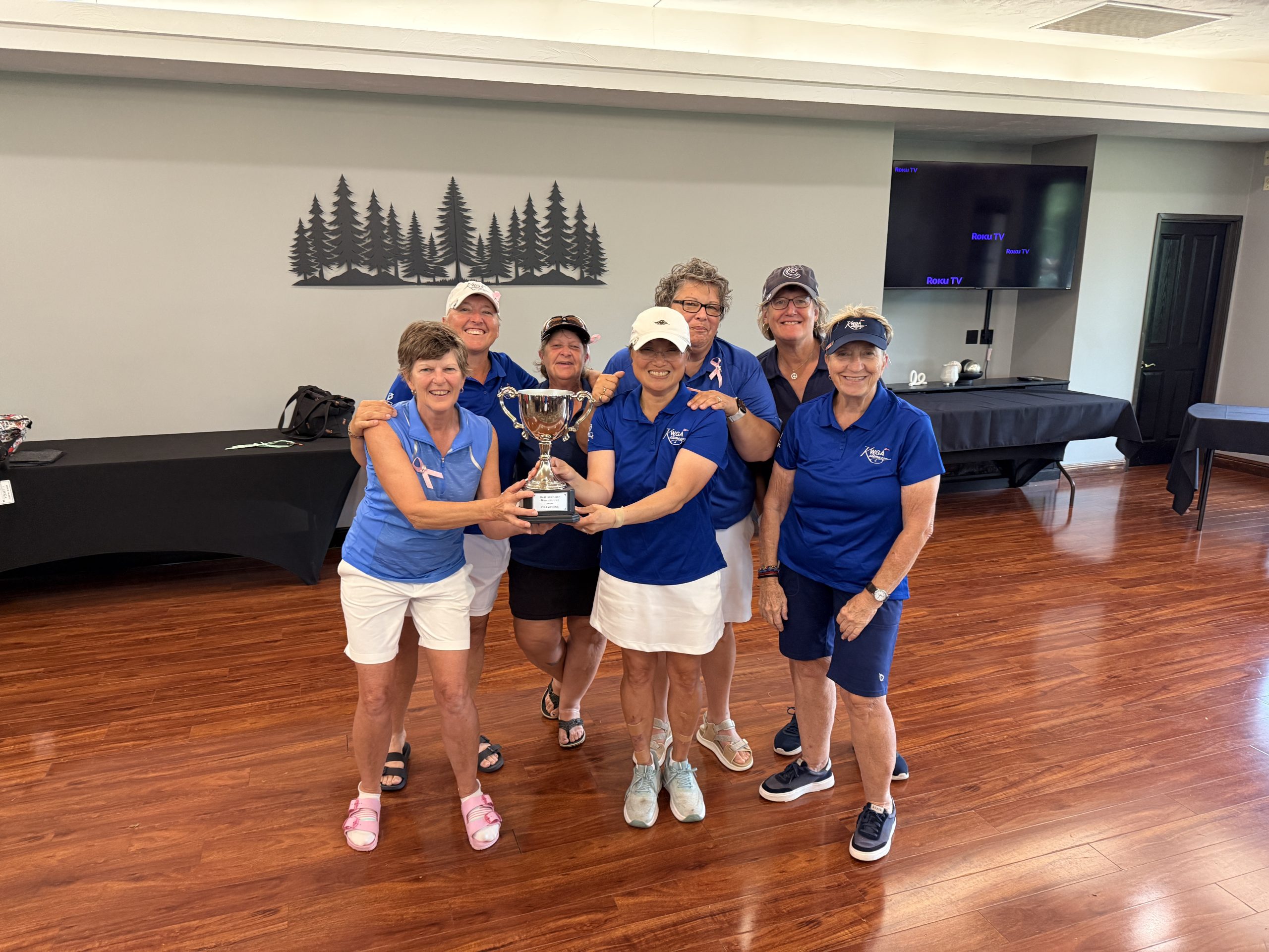 2026 KWGA Board members with the West Michigan Women's Cup.
